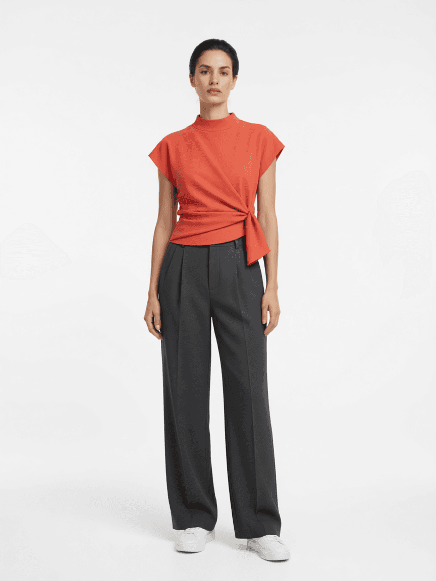 Actual app result using synthetic references: red top, grey trousers and white trainers on a model with a white background